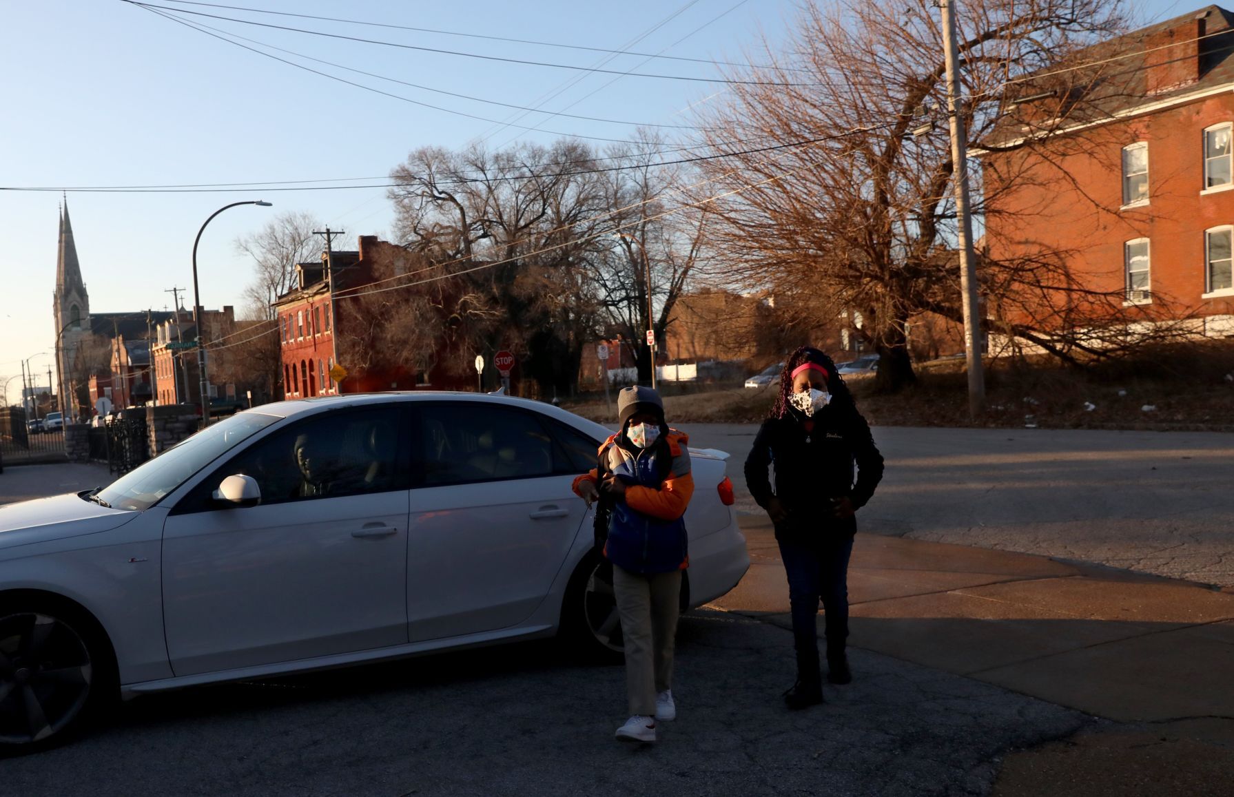 Siblings arrive for school at Clay Elementary